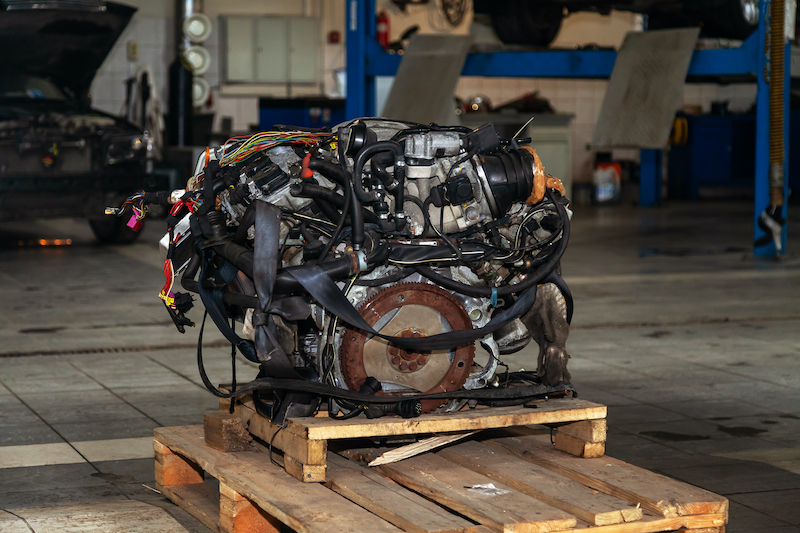 Used car engine in a shop ready for installation